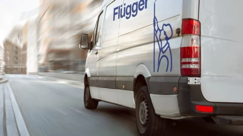 Varevogn med Flügger logo